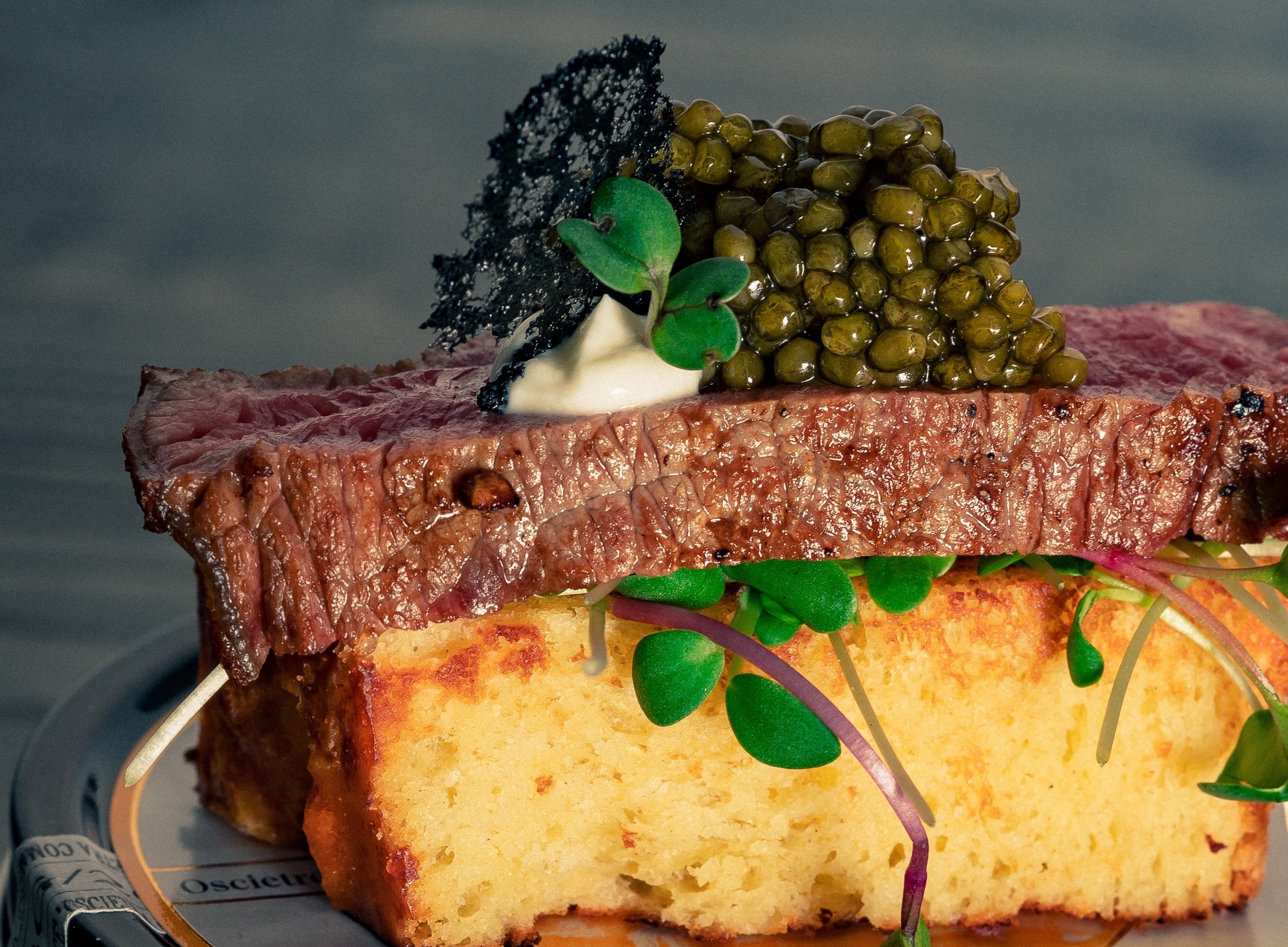 Beef Ribeye on French Brioche, Umami Sprouts, Horseradish Mousse, and Osciètre Caviar